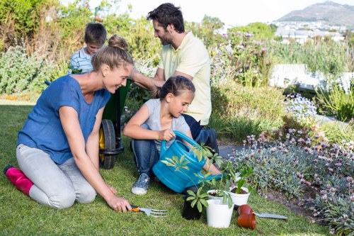 Gardener Sutton team arriving at a garden with tools and safety gear